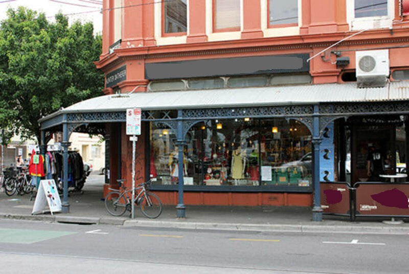 Shop front with street access and loading zone.