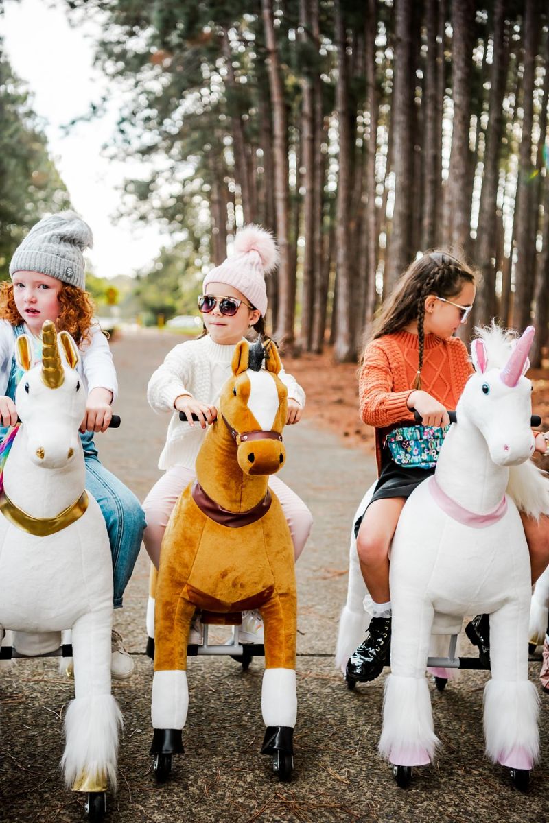Little Riders brown ride-on horse toy - friends riding ride-on horses and unicorns together